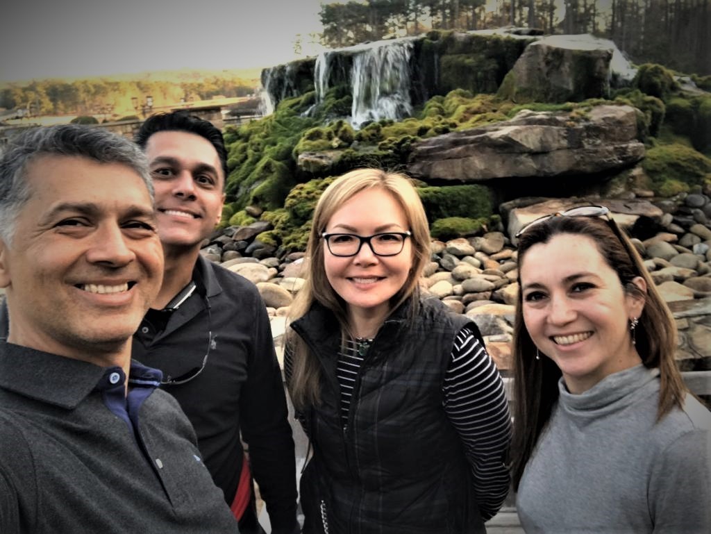 Aselia in center pictured with her partner Mauricio and his siblings