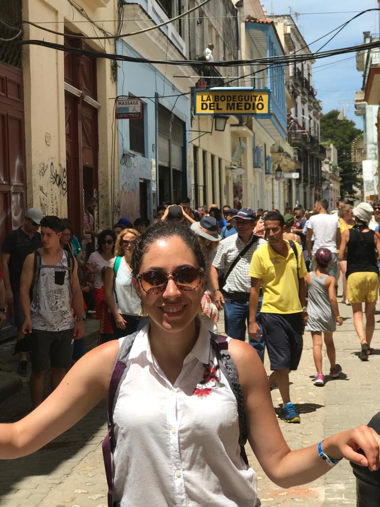 Mayra on a crowded street in Havana, Cuba