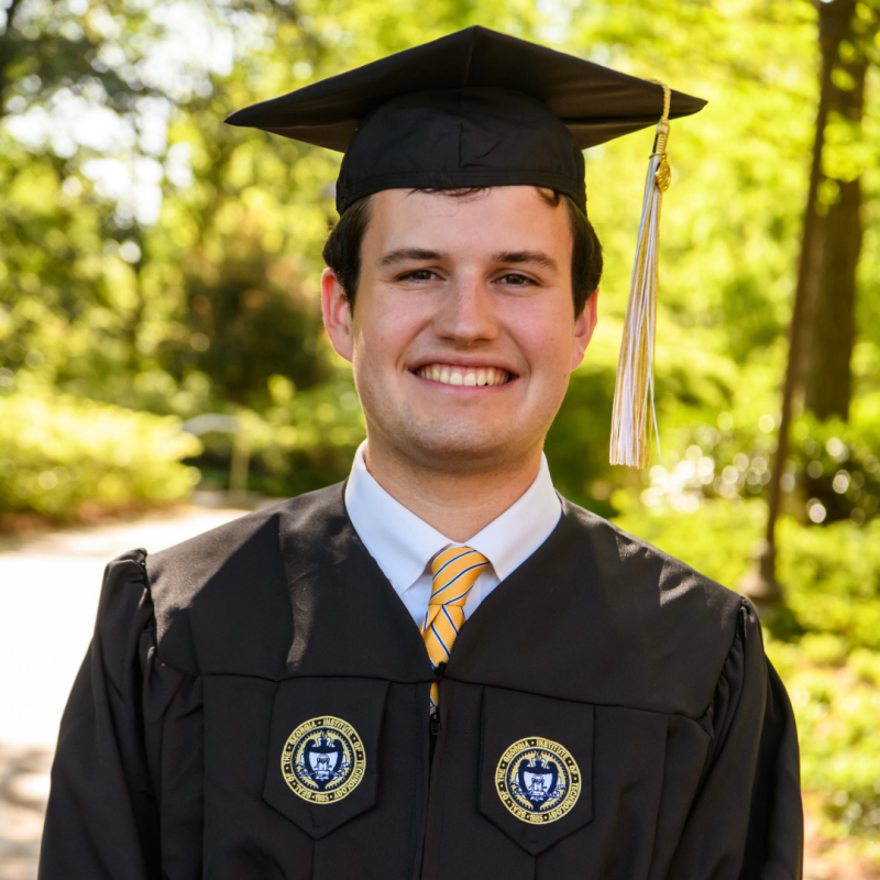 Photo of Connor in his grad cap and gown