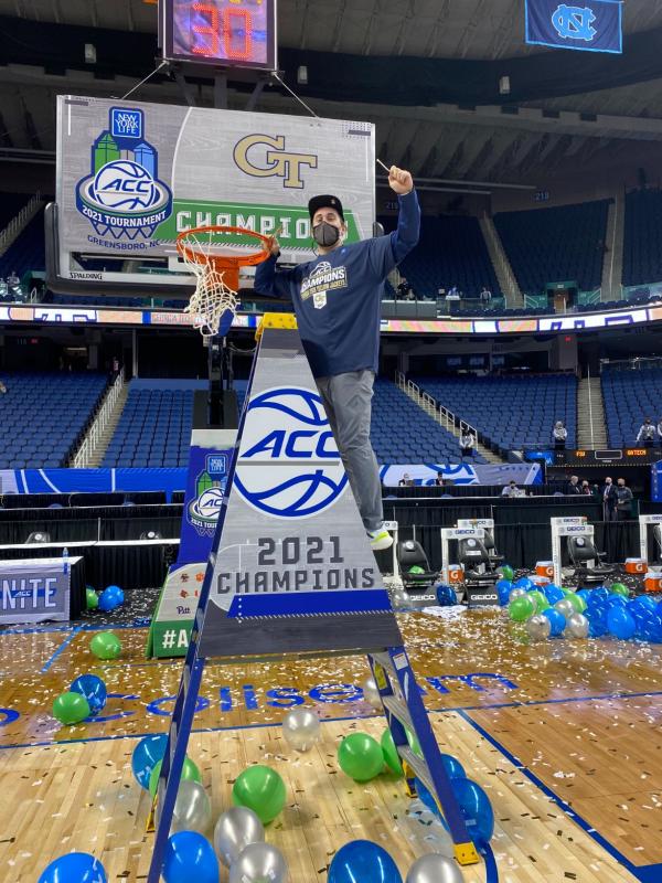 Max Goldstein celebrating ACC win on the basketball court