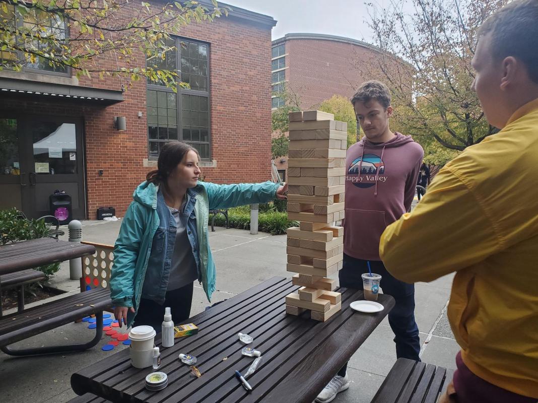Econ students playing giant jenga