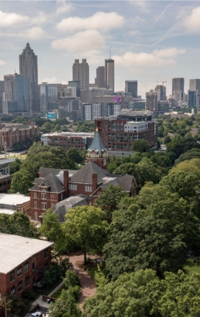 aerial view of GT campus with the city of Atlanta in the background