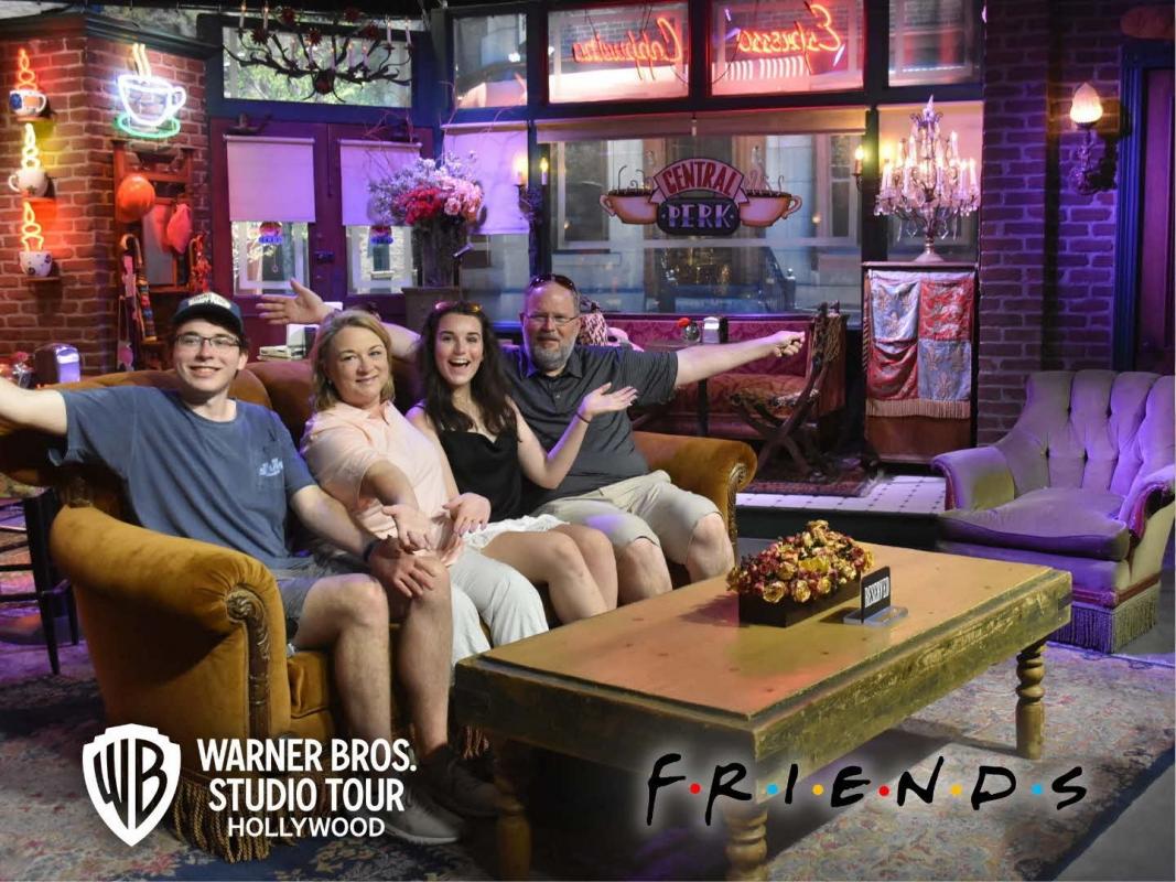 Wendy with her husband John and two children on the 'Friends' couch at Warner Bros Studio