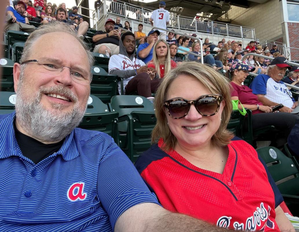 Wendy and her husband John at a Braves Game 